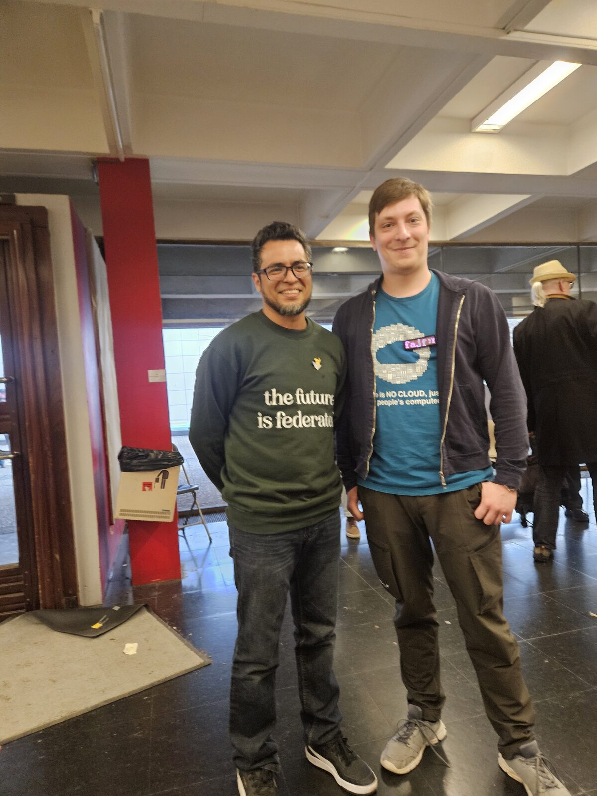 Friends enjoying FOSDEM